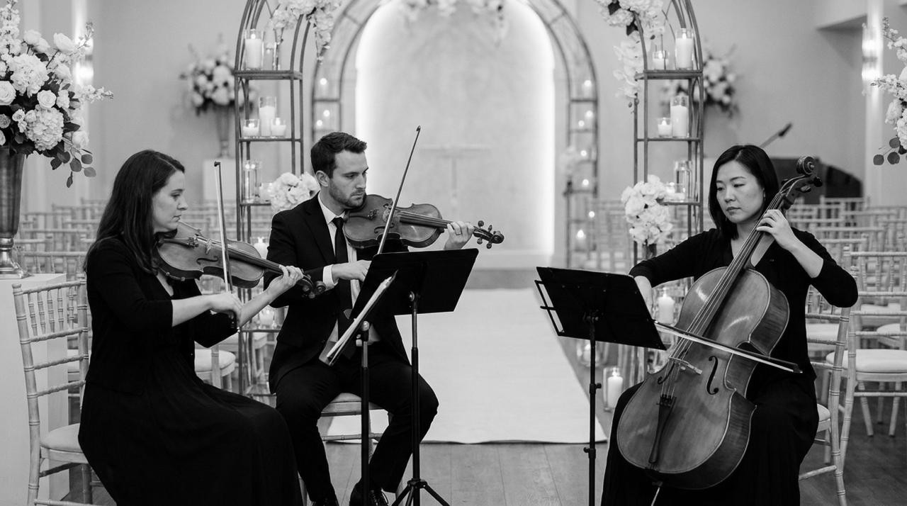 Live string trio performing at a wedding ceremony